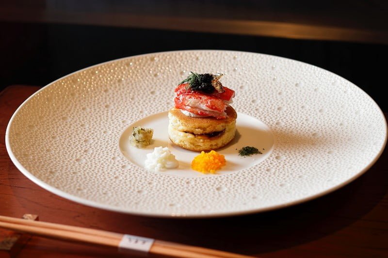 Potato Blinis served with crab meat and Caviar